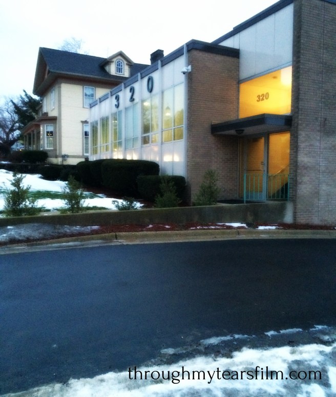 A Cross Reflected in the Abortion Clinic Window 320 Fulton